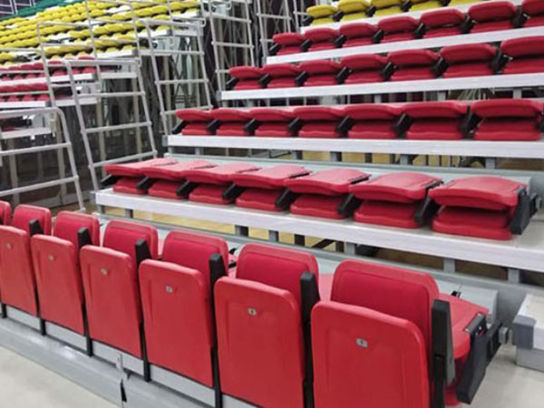 Rear-facing retractable bleacher seats